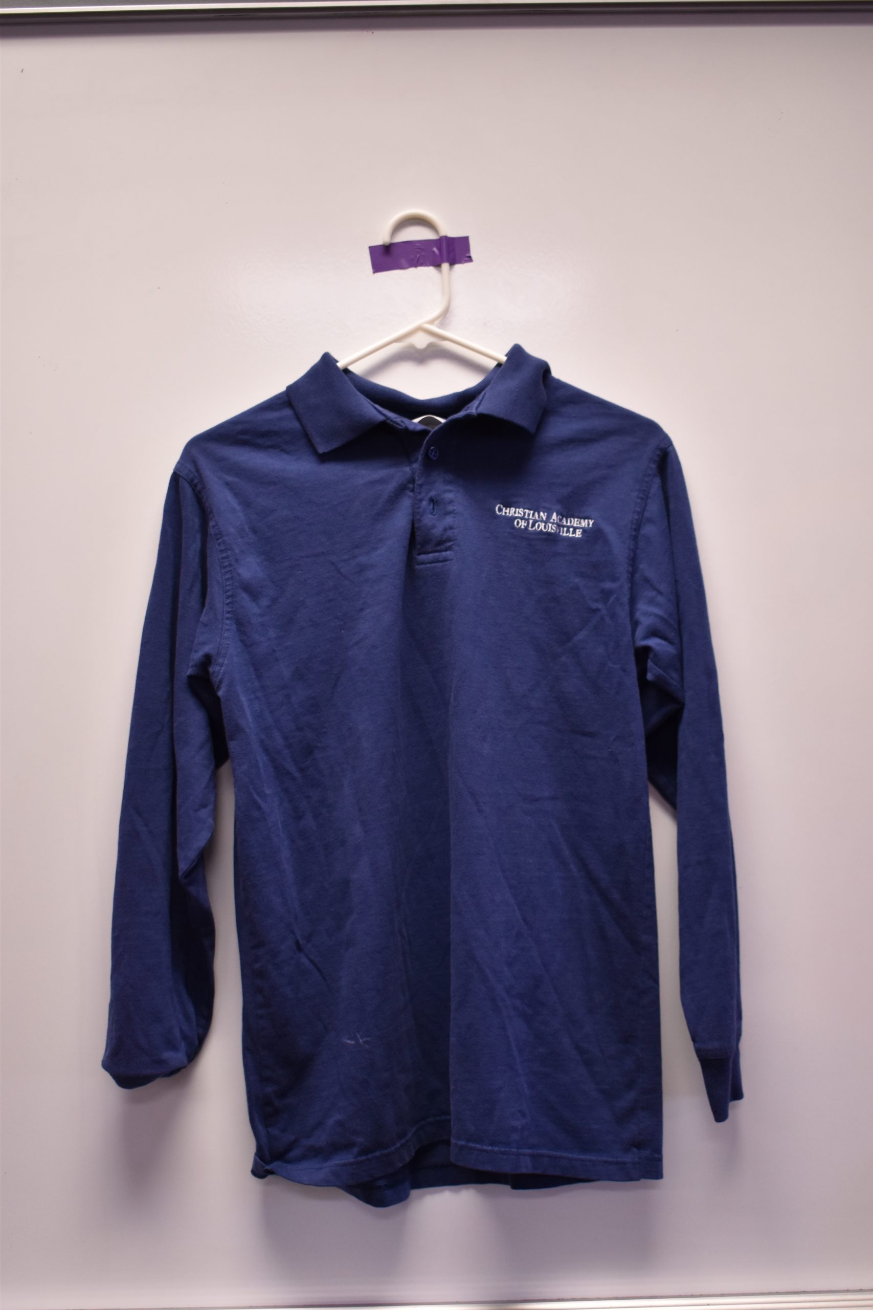 Christian Academy School System | Christian Academy of Louisville | Virtual Uniform Closet | Uniform Polo | Blue Long Sleeve | Letter Logo