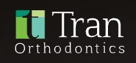 This Tran Orthodontics Logo Represents an offer for Braces or Invisalign as a Spotlight Silent Auction Item for the 2025 Christian Academy Gala